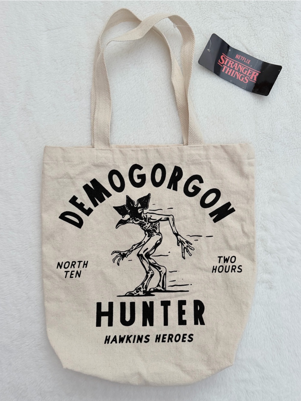 Netflix Stranger Things Demogorgon Hunter Canvas Tote Bag in Cream